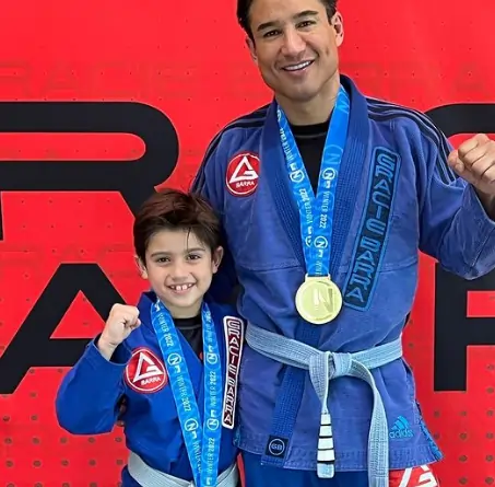 Mario Lopez and his Son after winning a BJJ Tournament